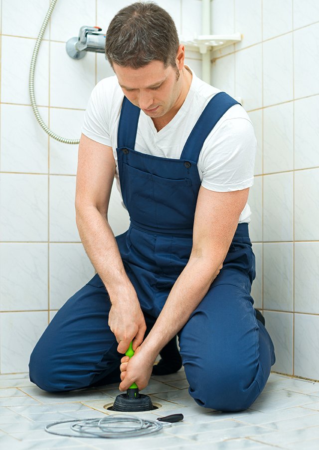Royal Flush plumber clearing a blocked drain in Tacoma Royal Flush plumber clearing a blocked drain in Tacoma